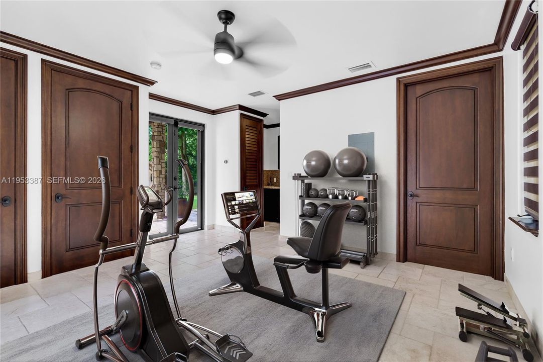 Guest House #1-Excercise room-Virtually staged
