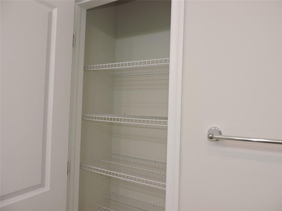 PRIMARY BATHROOM WITH LINEN CLOSET