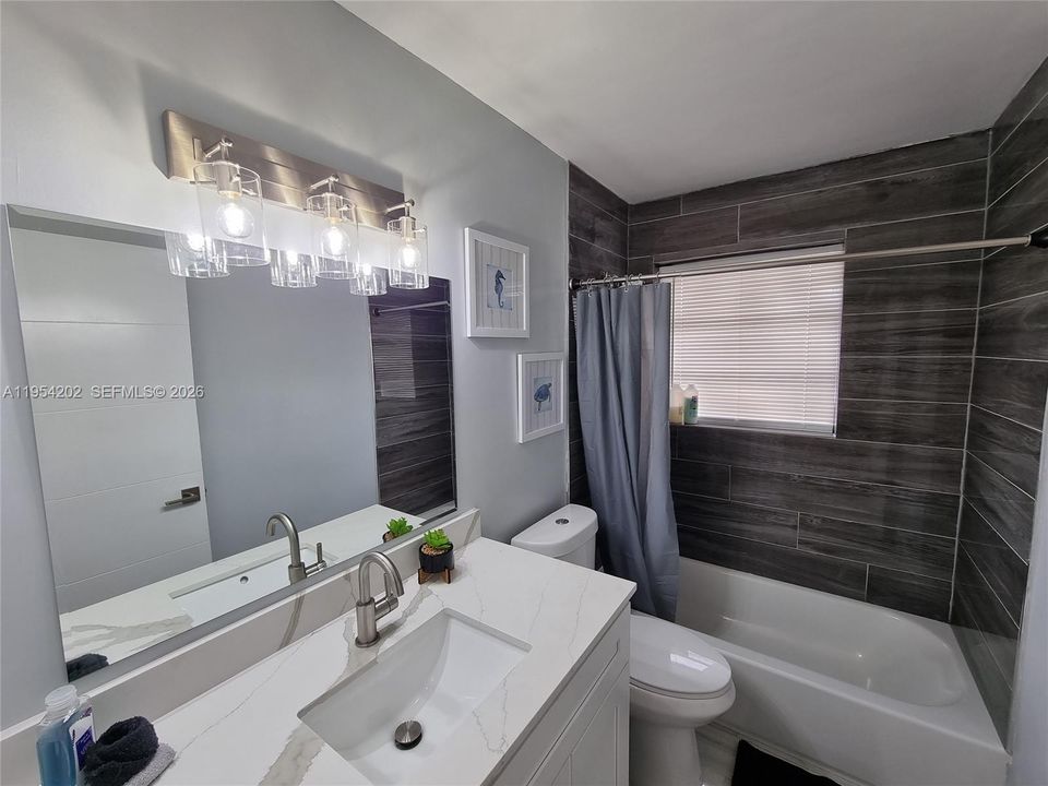 renovated bathroom with tub