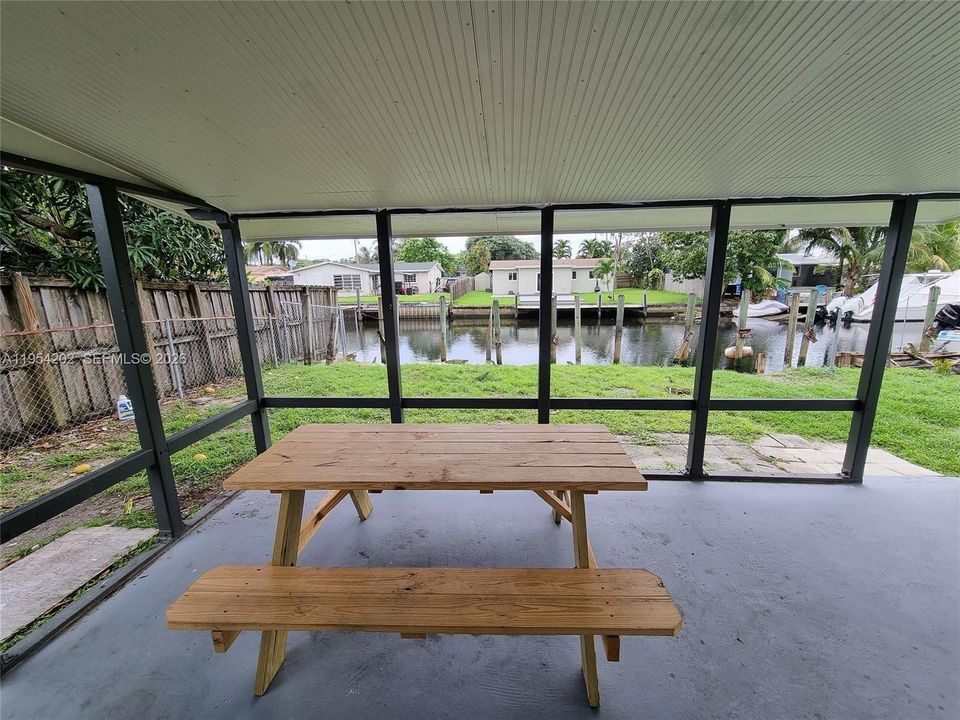 screened in back porch with water views