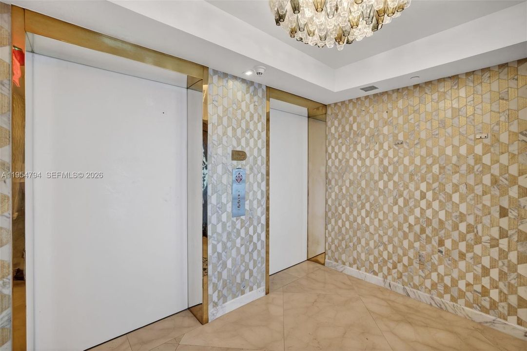 Step off the elevator to your private foyer.