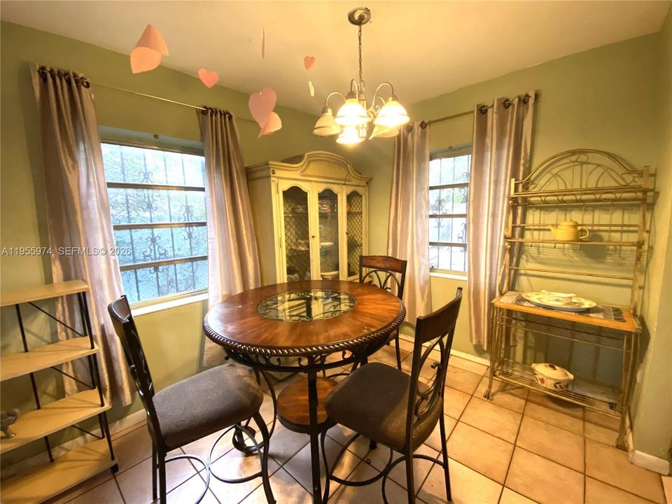 The dining area faces the kitchen