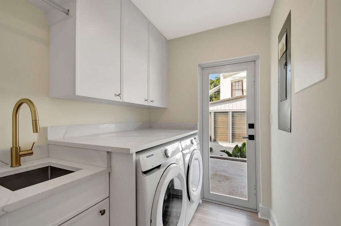 Laundry & Mechanical Room/Side Entrance