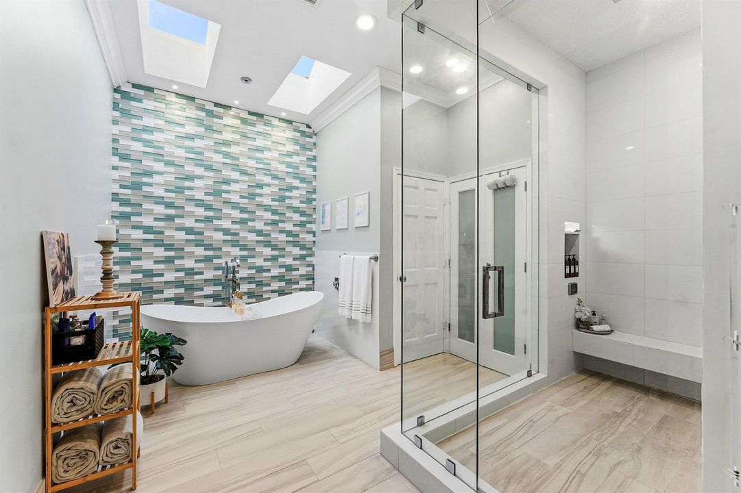 Primary Bathroom + Steam Shower + Tub