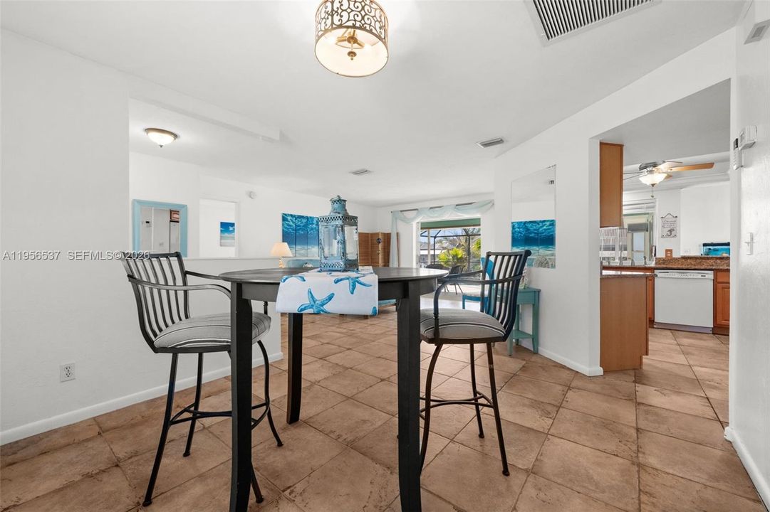 Dining area overlooking Kitchen and Living Room