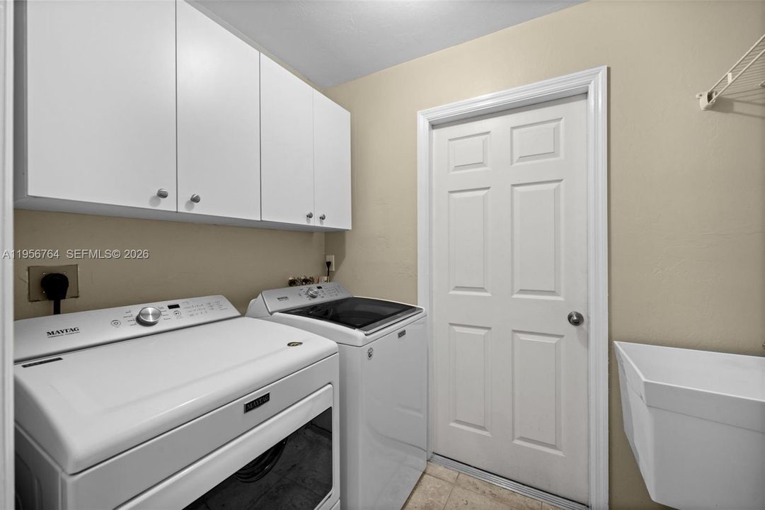 Laundry room with Laundry tub and extra storage