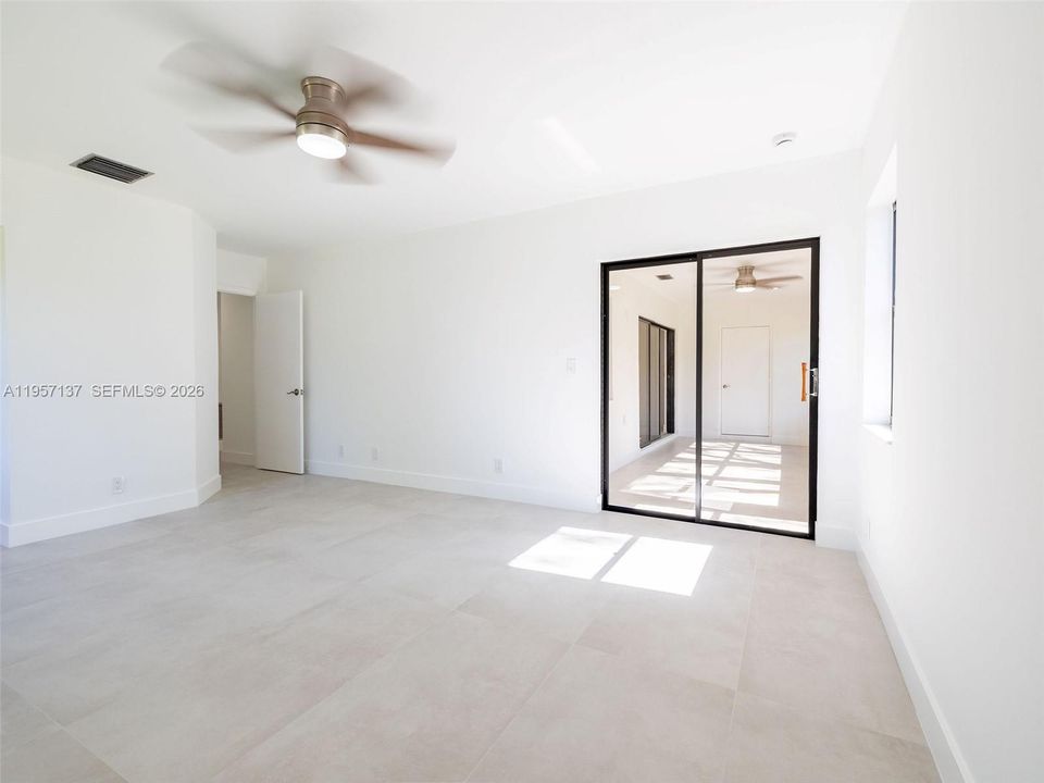 Primary Bedroom overlooking the Florida room