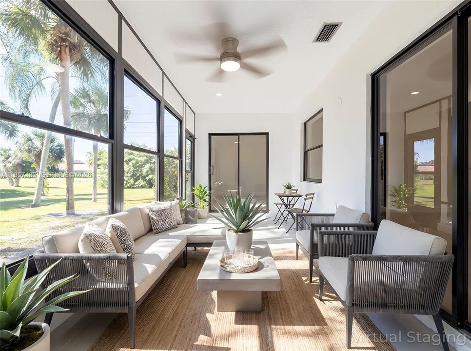 Pictures are virtually staged- Florida room completely enclosed, with A/C