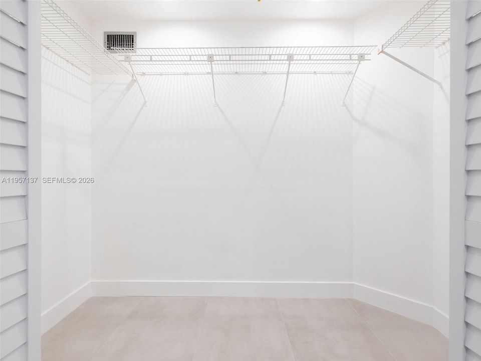 Spacious walk in closet in Primary Bedroom