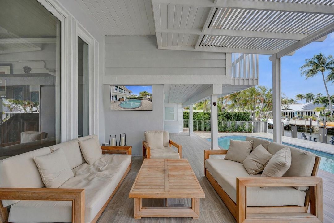 Tropical patio by the water canal