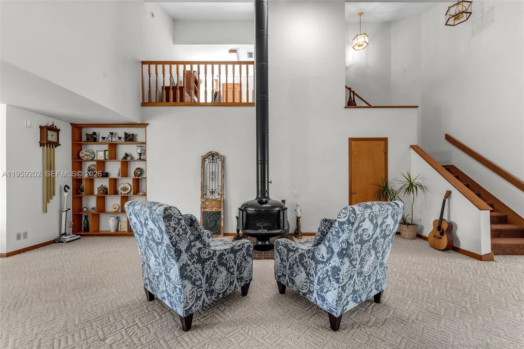 VOLUME CEILING W POT BELLY STOVE