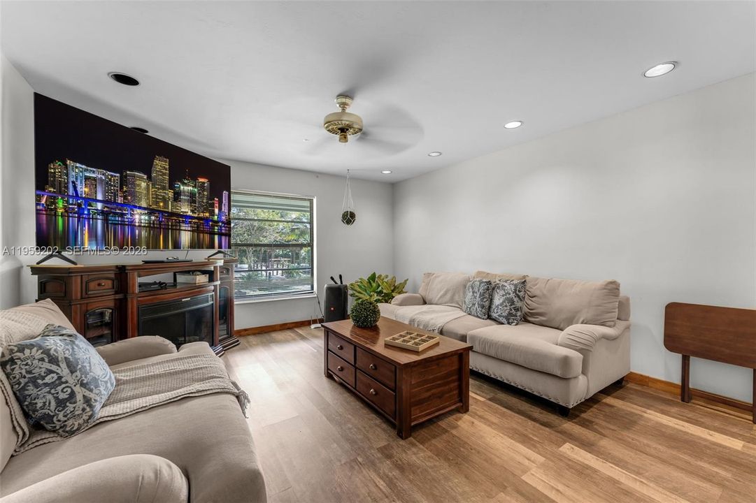 FAMILY ROOM WITH MODERN WOOD FLOORS