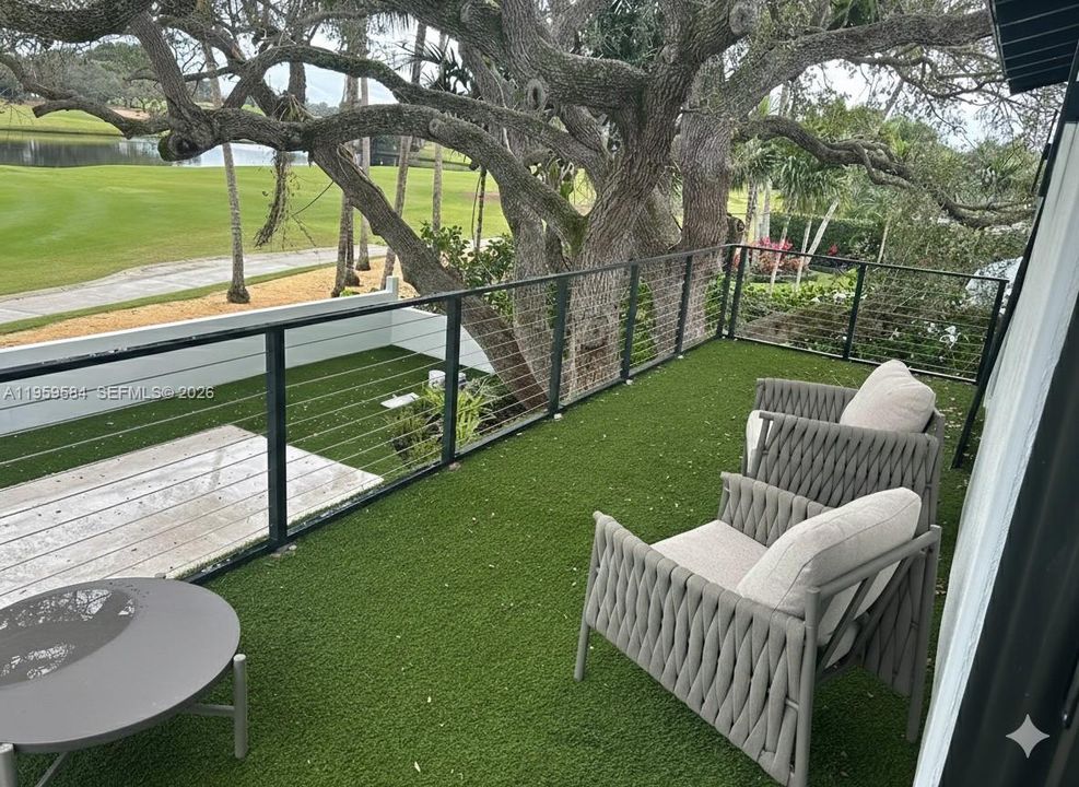 Balcony overlooking 13th hole of Jack Nicklaus Golf Course on NPB Country Club