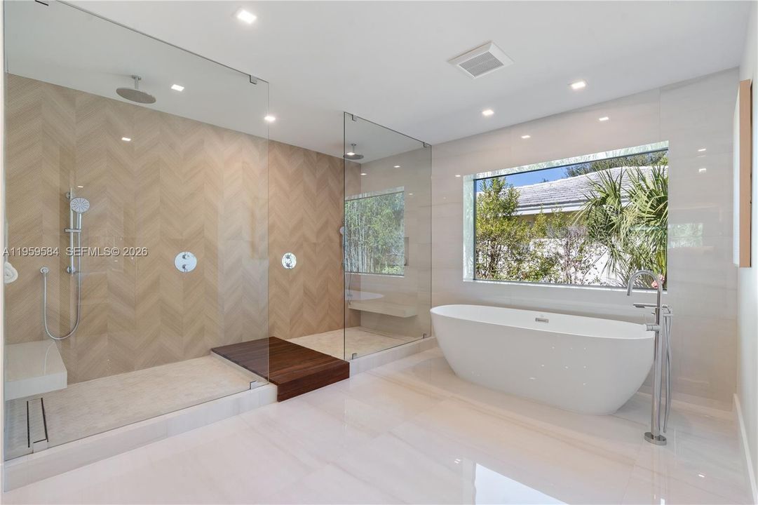 Double shower and bath tub on Primary Bathroom
