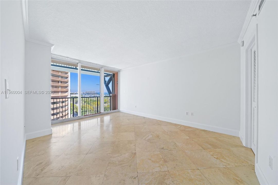 Primary bedroom features a walk-in closet, en-suite bathroom, and bay views
