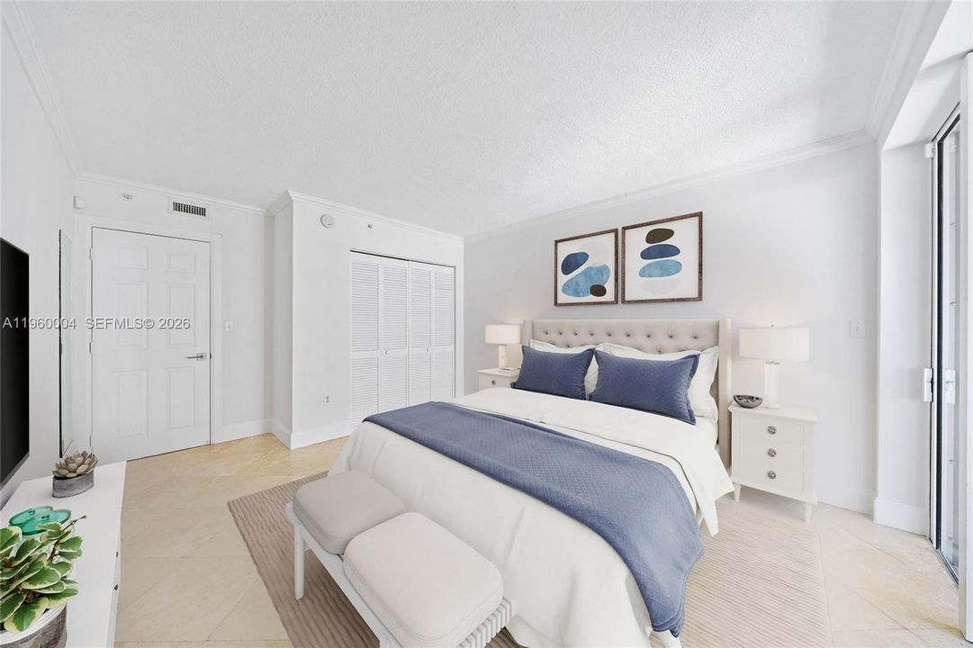 *Virtually Staged* Second bedrooms offers privacy on the opposite end of the unit, with its own access to the balcony.