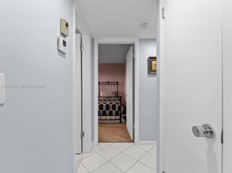 hallway entry to guest bedroom