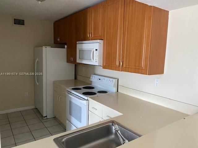 Activo con contrato: $229,900 (2 camas, 2 baños, 1113 Pies cuadrados)
