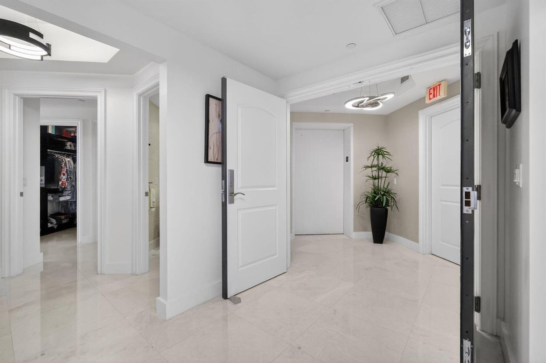 Elevator opens into foyer