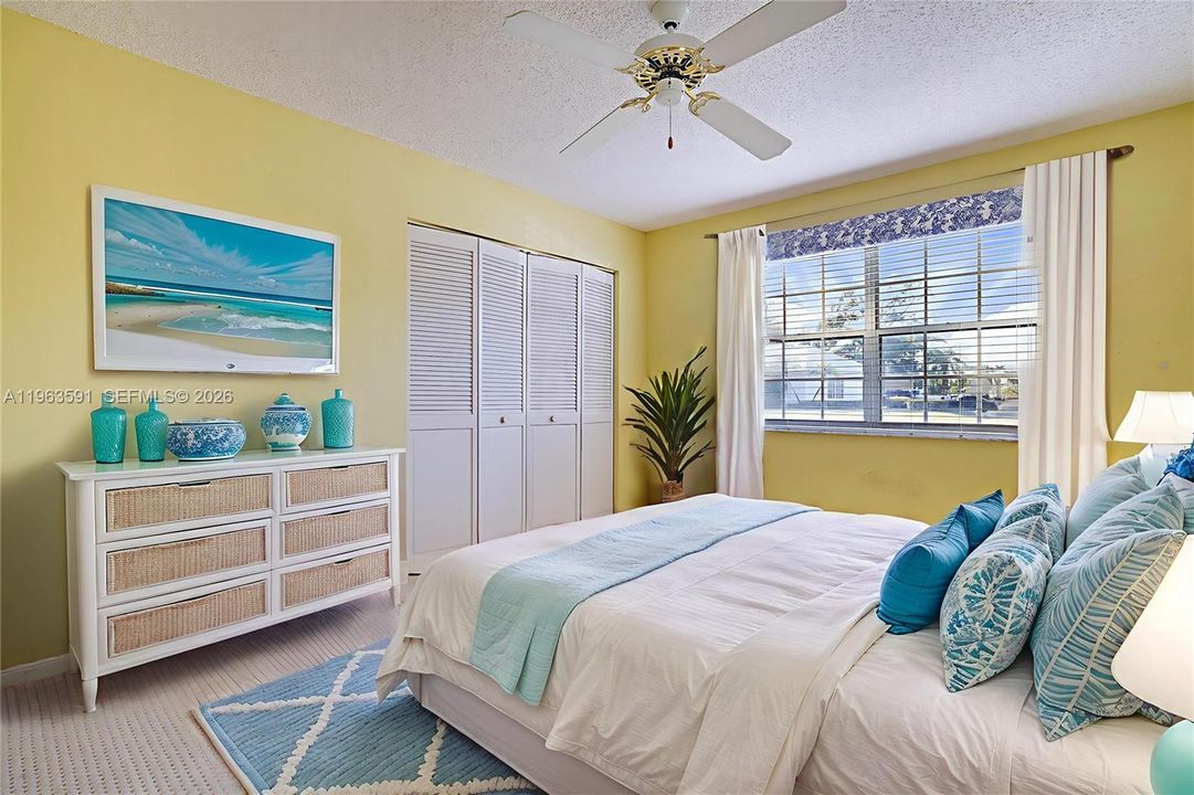 Bright and cheery Bedroom Large closet , full bathroom