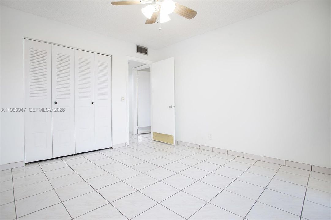 GUEST BEDROOM WITH WALK-IN CLOSET