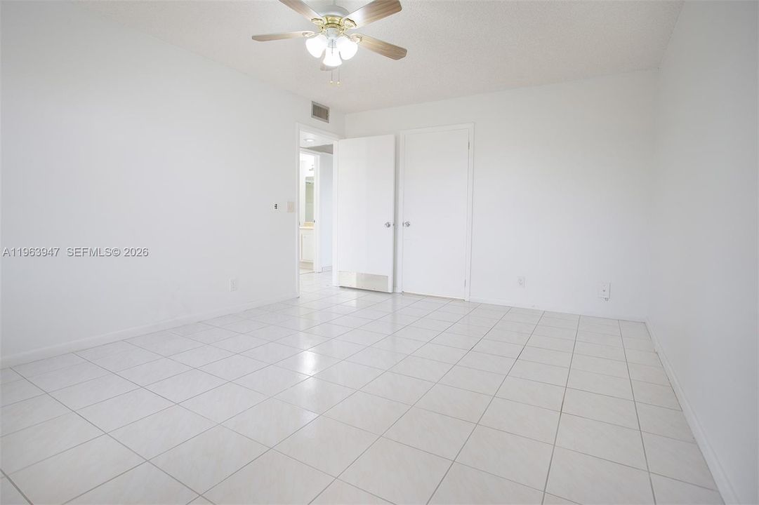 LARGE PRIMARY TILED BEDROOM