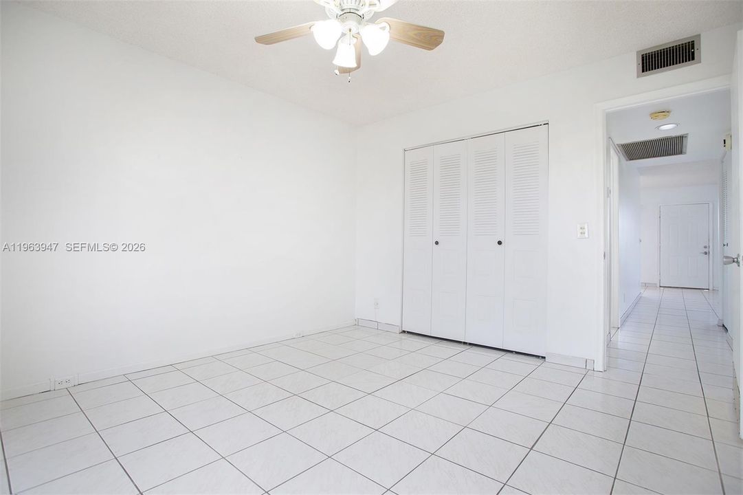 SPACIOUS GUEST TILED BEDROOM