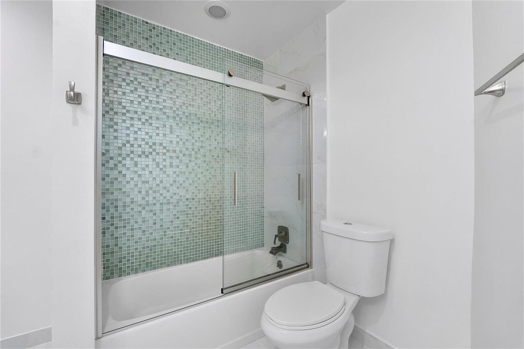 Another pretty updated white bathroom