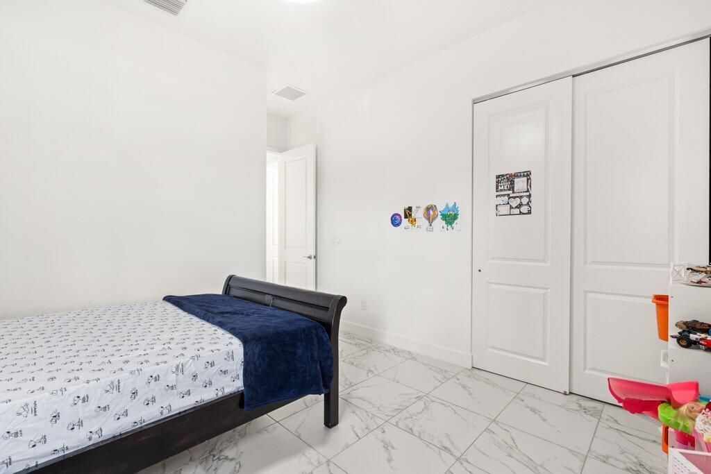 Guest Bedroom to Entry.jpg-SMALL