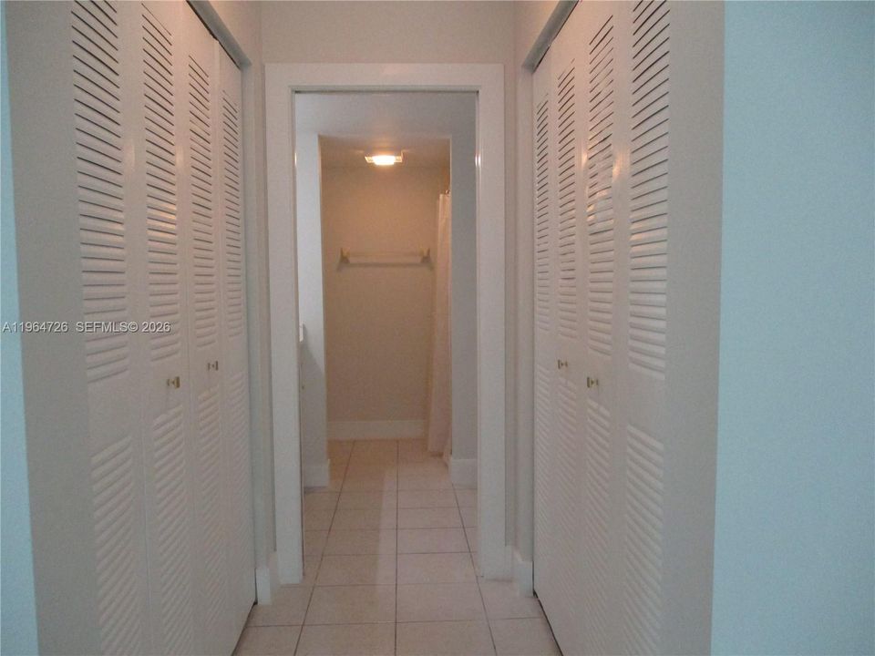 THE HALLWAY WITH TWO CLOSETS