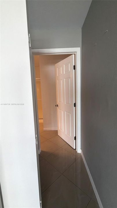 Hallway to laundry and Garage