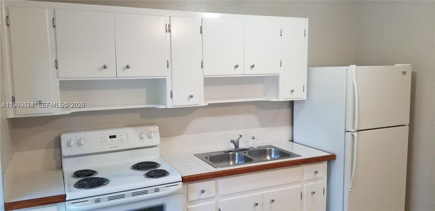 Classic white cabinets and appliances