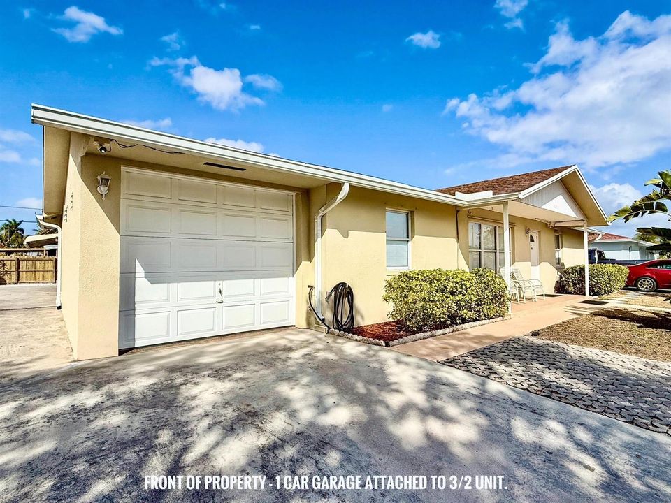Front of property - 1 car Garage At