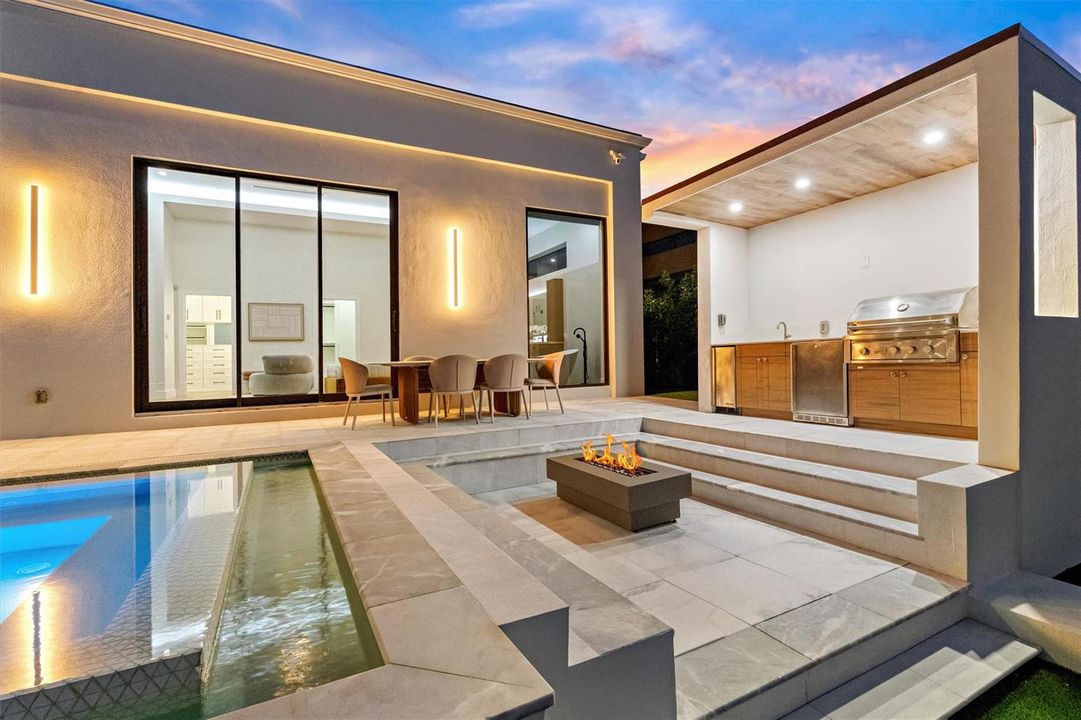 Outdoor Summer Kitchen and Firepit Area