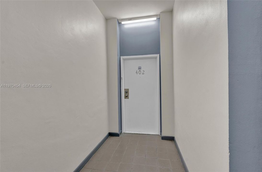 End of hall entry near stairwell