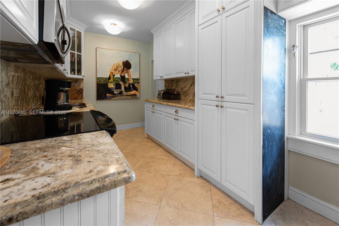 CLASSIC GALLEY KITCHEN WITH TONS OF STORAGE SPACE