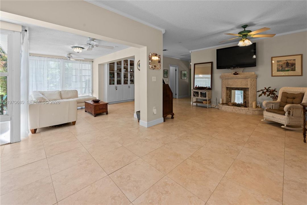 LIVING ROOM W BUILT IN SHELVING