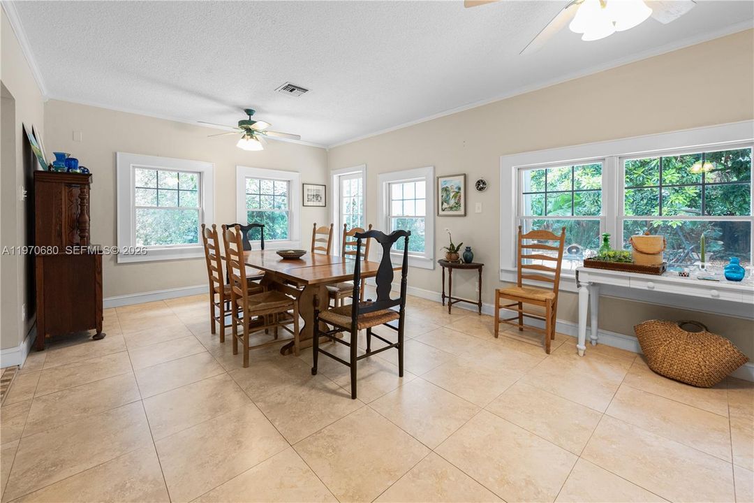 BEAUTIFUL DINING AREA COMPLETE WITH LOVELY WINDOWS.
