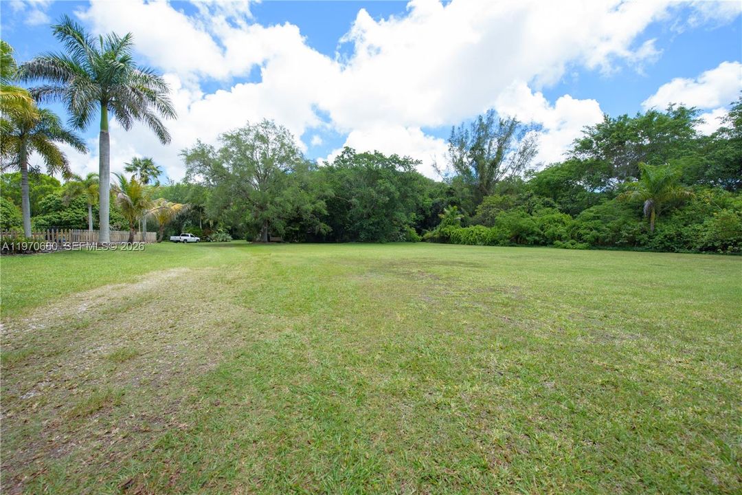 CLEARED ACREAGE ADJACENT TO POOL