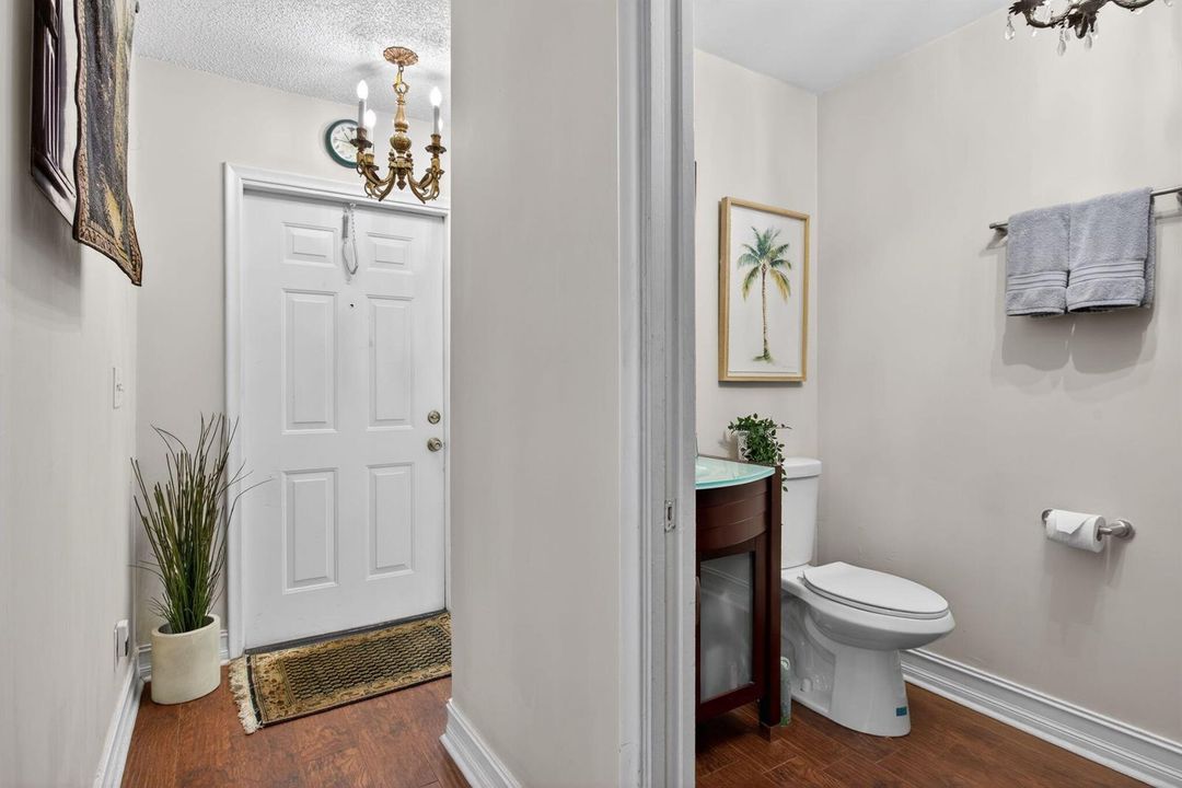 View of Entry & 1/2 Bath/Laundry Closet