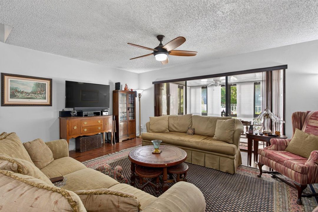 Living Space w/Sliders to enclosed patio