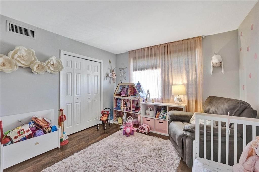 2nd Bedroom shown with kids decor.