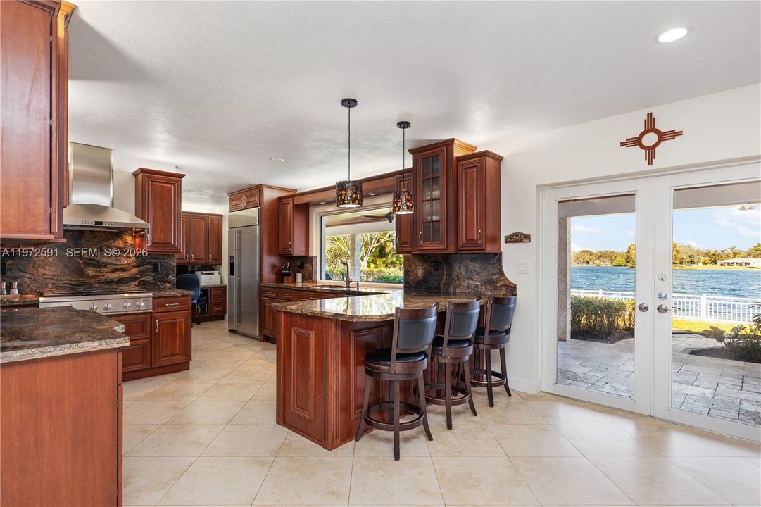 Lake view from kitchen picture window and sliding door