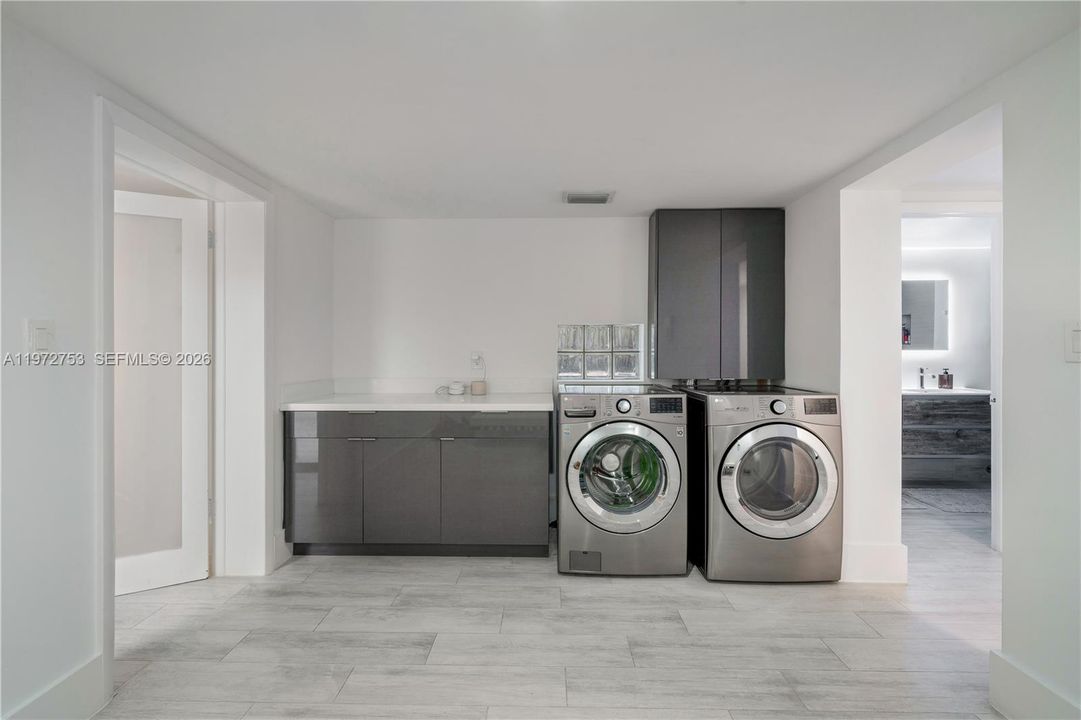 Two full laundry areas: one on the ground floor and the other on the third floor
