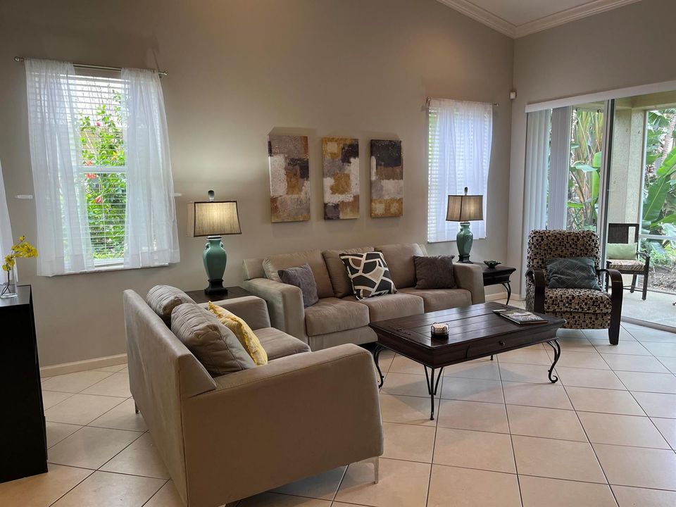 Living area looks out to lanai