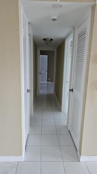 Hallway leading to bathroom and bedrooms