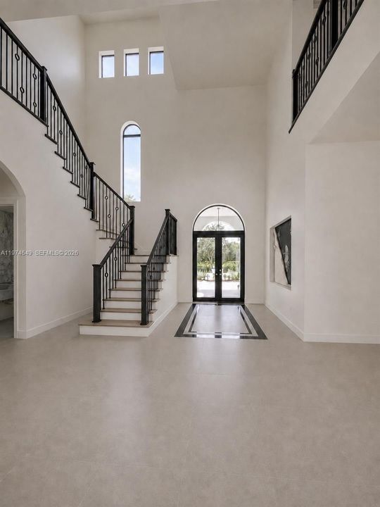 Grand entrance and stairs.