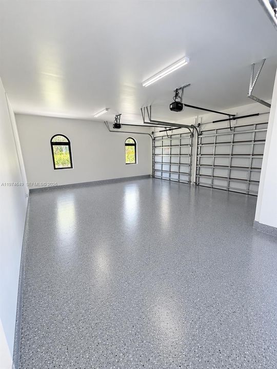 garage will have epoxy floor. AI staged.