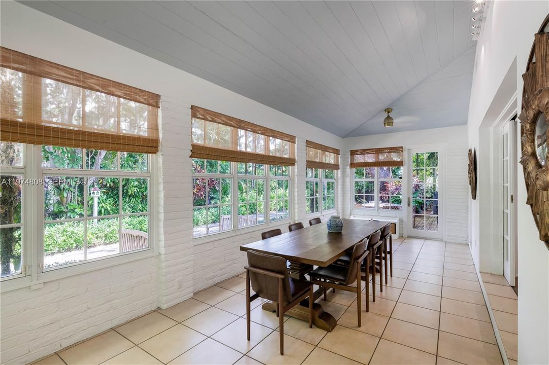 Additional image of dining area showing more outdoor access.