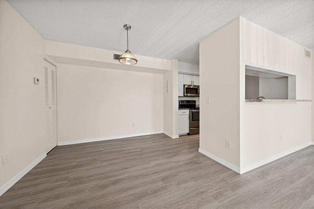 LIVING ROOM TO DINING AREA
